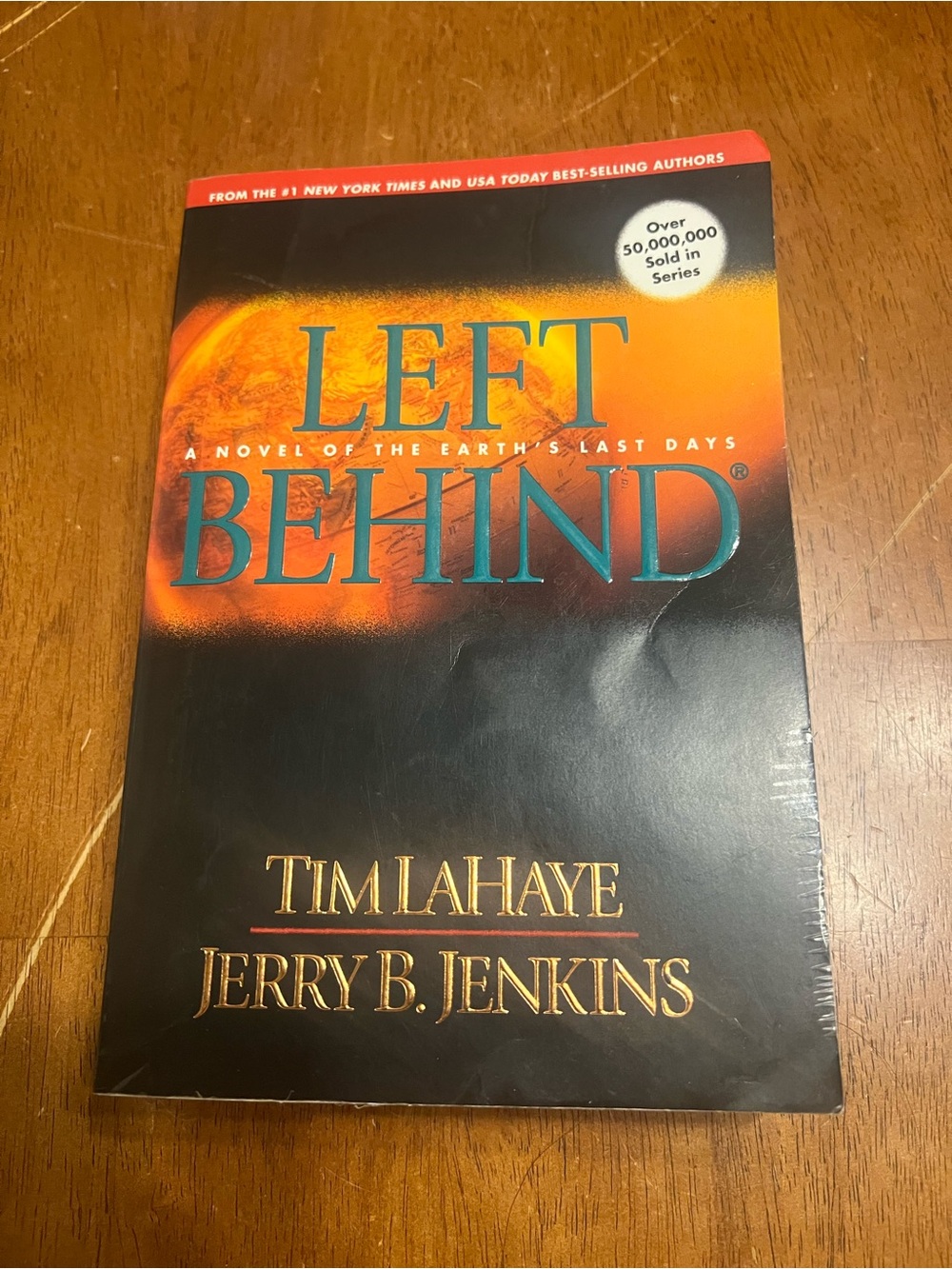 Left Behind by Tim LaHaye & Jerry B. Jenkins - Black/Orange Cover